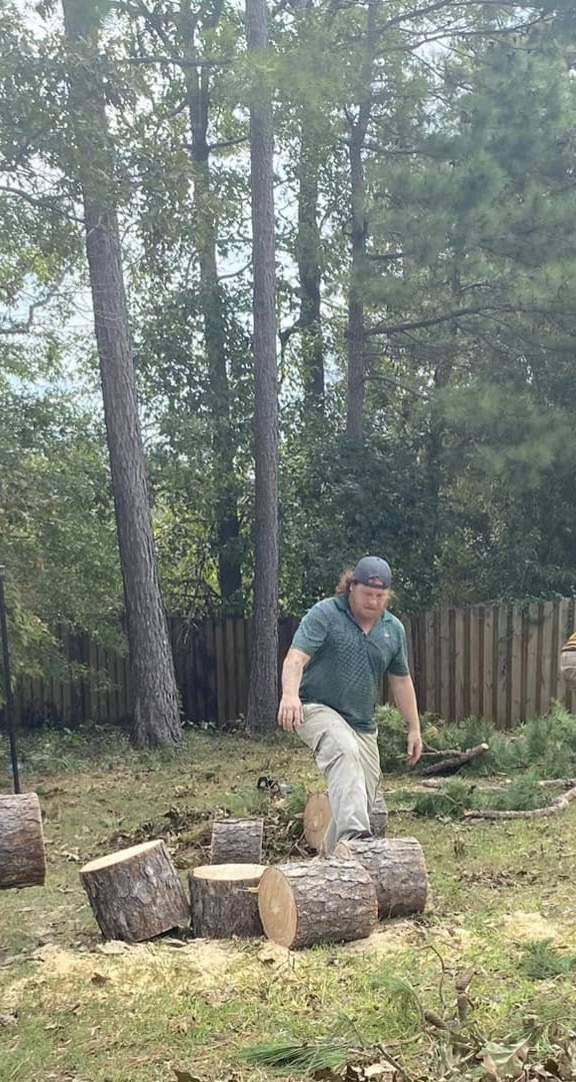Phillip Barrett, owner of Barrett's Tree Removal and Landscaping, on the job site in Grovetown, GA